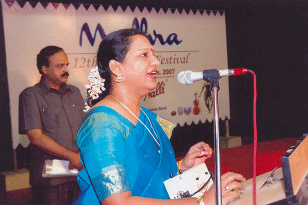 Radha Bhaskar singing the prayer