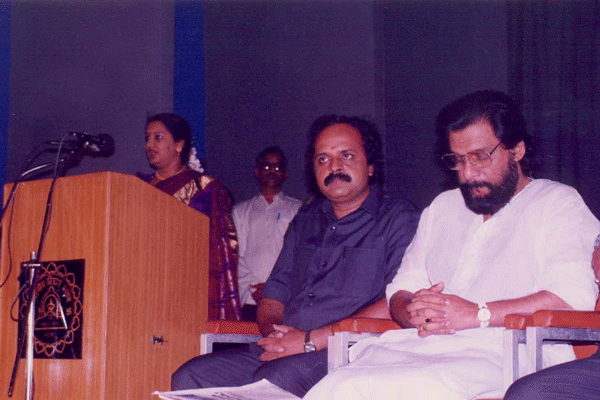 Dr.Yesudas listening to the introduction by Dr.Radha Bhaskar
