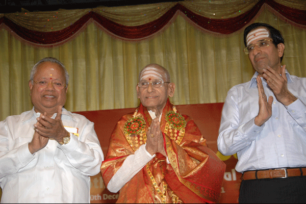 Dr.Nalli and V.Shankar greets the awardee Dr.Nedanuri Krishnamurthy