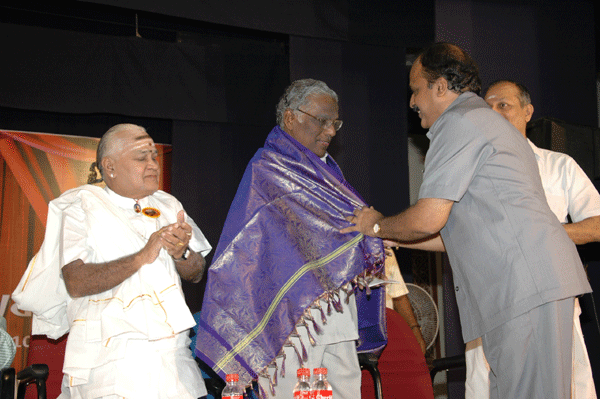 A.Natarajan being honoured by the Secretary