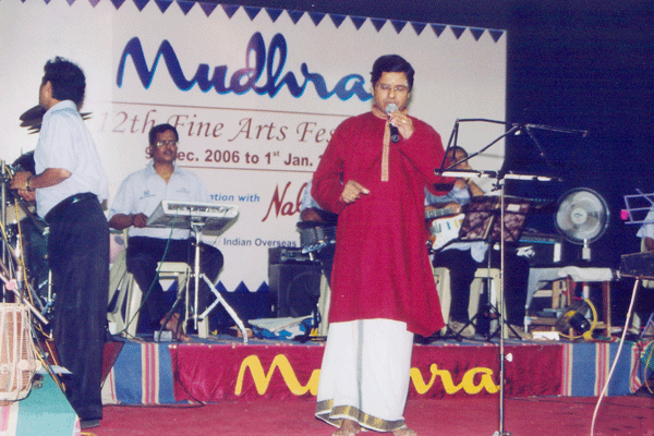 Dr.Ganesh singing classical with light music Orchestra