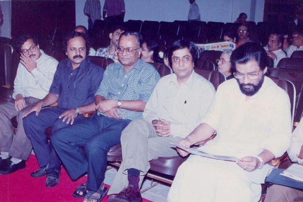 Being seated among the audience before the inauguration