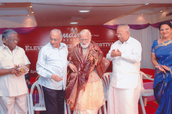 Honouring T.K.Govinda Rao with a Shawl