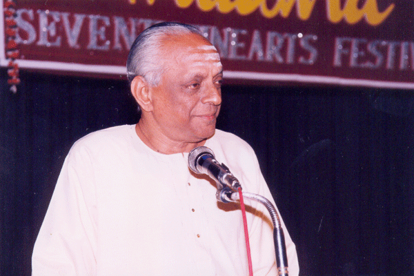 R.Krishnaswamy, Secretary Narada Gana Sabha felicitates the awardee