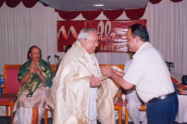 Dr. Nalli being honoured