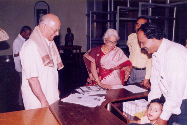 Poornam Viswanathan with his wife enjoying the moments of Jathiswar, Mudhra Bhaskar’s Son.