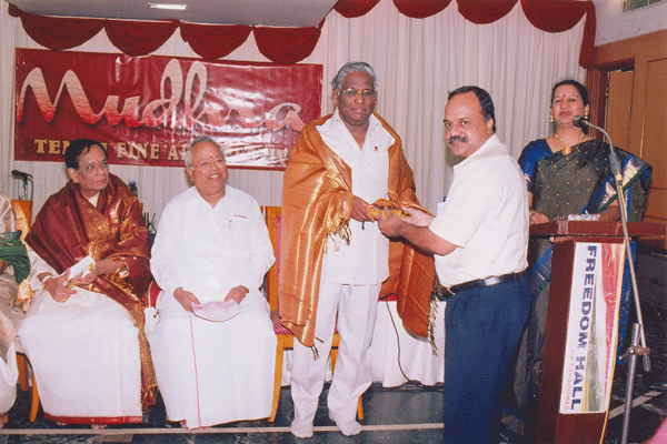 Mudhra Bhaskar honouring A.Natarajan