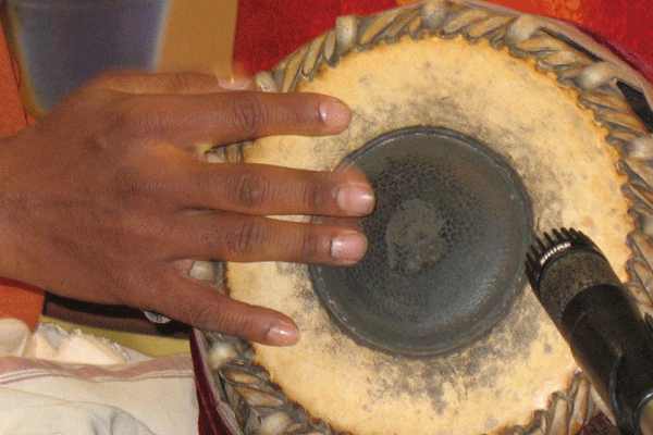 A close up on mridangam playing