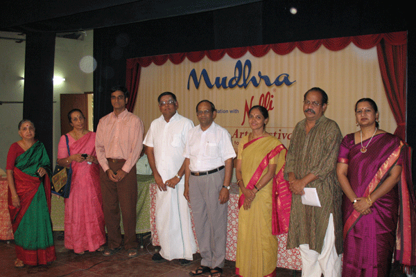 First prize participants with quiz masters and sponsors