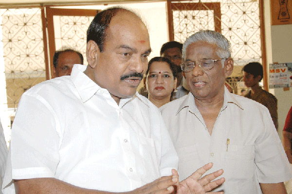 Dr.S.Jagathrakshagan, Honorable Minister of State for Information and Broadcasting enters the venue with A.Natarajan
