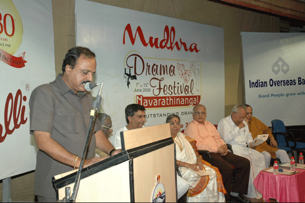 Mudhra Bhaskar giving his report