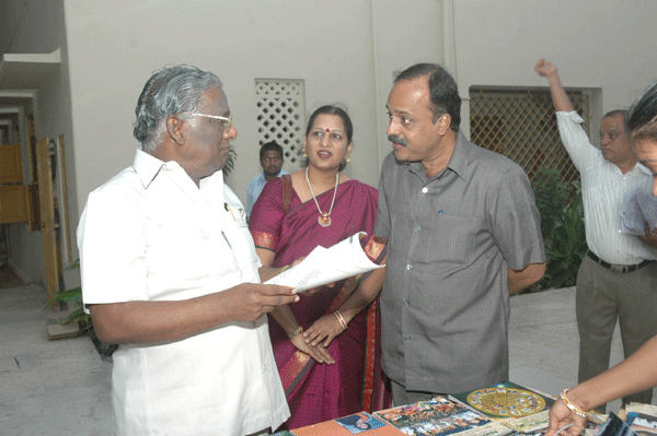 Secretary and treasurer discussing with the vice-president